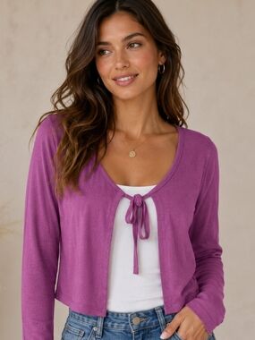Soft feel long sleeve sweater with a tie-front neck, perfect for layering.